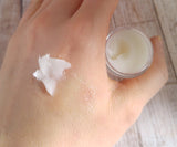 Organic healing salve on hand, blister care, nursing nipples, wound care