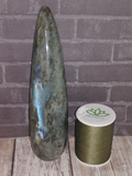 Labradorite from Madagascar GGandJ.com with thread spool size reference