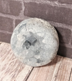Celestite Gemstone from Madagascar Sphere on wood grain Gypsy Gems & Jewelry