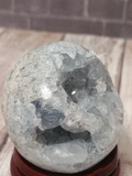 Celestite Gemstone from Madagascar Sphere on wood grain Gypsy Gems & Jewelry