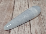 Celestite Gemstone from Madagascar Wand on wood grain Gypsy Gems & Jewelry