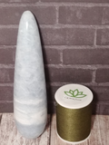 Celestite Wand with thread spool size reference