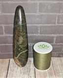 Natural green moonstone gemstone wand from Madagascar with thread spool size reference