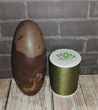 Shiva Lingam with thread spool size reference on GGandJ.com Gypsy Gems Naturally Unique