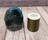Blue Apatite Tower with thread spool size reference