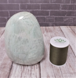 Garnierite cut base free form tower with thread spool size reference