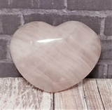 Rose Quartz Heart on Wood Grain and brick Background GGandJ.com Gypsy Gems & Jewelry Naturally Unique