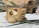 Baby inside of mother turtle carved gemstone on GGandJ.com Natural Baby Shower gift idea