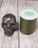 2" Pyrite Skull with thread spool size reference GGandJ.com Gypsy Gems and Jewelry