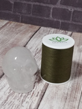 Gemstone Skull with thread spool size reference