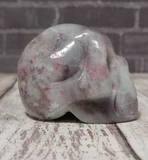Side view of gemstone skull