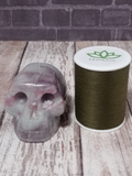 Gemstone Skull with thread spool size reference