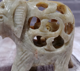 Baby inside of mother elephant carved gemstone on GGandJ.com Natural Baby Shower gift idea