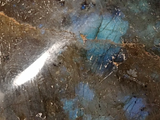 Iridescent gemstone gallet on wood grain background Labradorite from Madagascar GGandJ.com