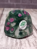Tumbled red green and white ruby fuchsite spotted gemstone nugget