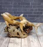 Side View of triple dolphin statue wood carving sea life gift idea
