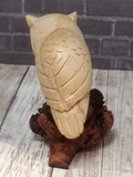 backside of wood owl