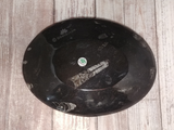 backside of oval fossil plate