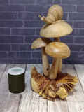 wood snail on mushroom with thread spool size reference