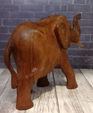 Rear view of hand carved wood elephant