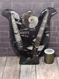 Fossil Statue with thread spool size reference