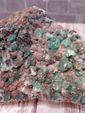 Close up of epidote on baryte barite gemstone Naturally Unique GGandJ.com