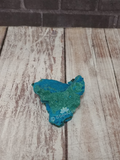 Sharks tooth shaped blue and green gemstone