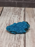 blue gemstone mineral on simple background ggandj.com