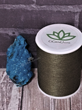 Chrysocolla mineral from Mozambique with thread spool size reference on GGandJ.com Naturally Unique
