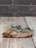 Side view of Epidote on Baryte
