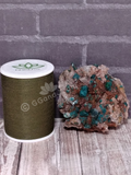 Epidote and calcite on Baryte with thread spool size reference