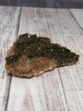 Side view of Epidote on Quartz