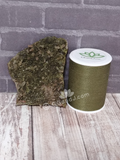 Epidote on Quartz with thread spool size reference