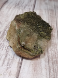Side view of Epidote on Quartz