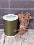 Stromatolite with thread spool size reference