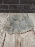 Blue druzy gemstone with clear crystal points