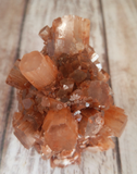 Aragonite Ball from Morocco on GGandJ.com Natural Red Gemstone Mineral Firework Explosion shape