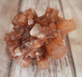 Aragonite Ball from Morocco on GGandJ.com Natural Red Gemstone Mineral Firework Explosion shape