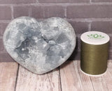 Celestite Crystal Heart with size reference