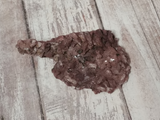 Pink Dolomite on wood grain background