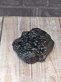 Naturally smooth black rock from Africa