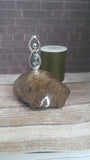 Goddess on coral with thread spool size reference