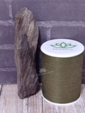 Petrified wood with thread spool size reference