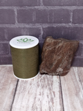 Petrified wood with thread spool size reference