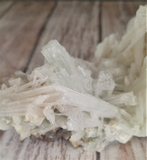 Scolecite Mineral from India on GGandJ.com Natural white spiky gemstone