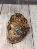 Orange Vanadinite on Black Hematite for sale on GGandJ.com