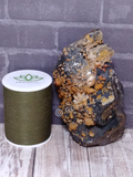 Vanadinite on Hematite with thread spool size reference