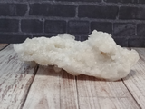 Side view of Apophyllite with Chalcedony on Prehnite