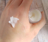 Healing salve absorbing into skin on hand Organic Wound Care GGandJ.com Natural Healing products