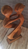 Abstract Wooden People Statue